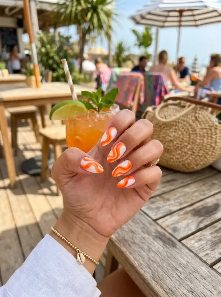 11.Orange Swirl Nail Design