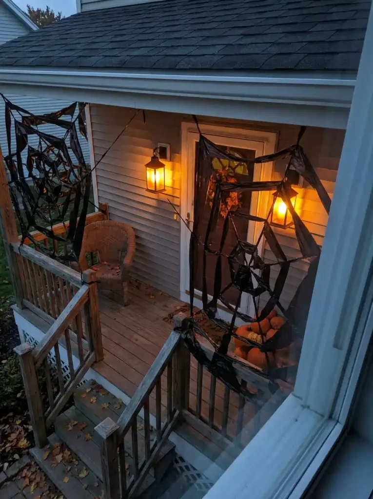 The Low-Budget Front Porch Trash Bag Spiderweb Canopy